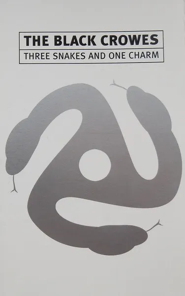 Three Snakes And One Charm