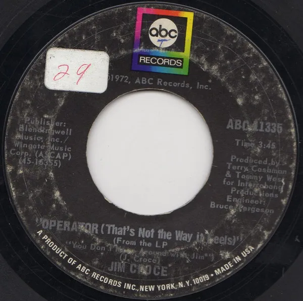 Operator (That's Not The Way It Feels) / Rapid Roy (The Stock Car Boy)