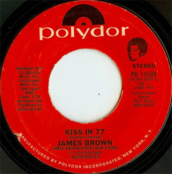 Woman / Kiss in 77