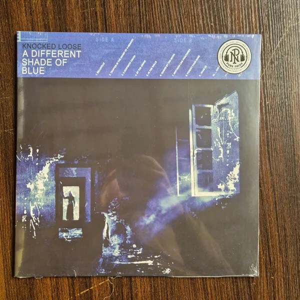 A Different Shade Of Blue (Limited Edition) (Colored Vinyl)
