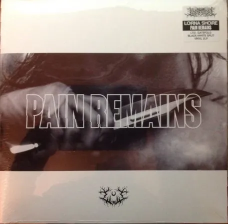 Pain Remains (Limited Edition) (Black/White Split Vinyl)