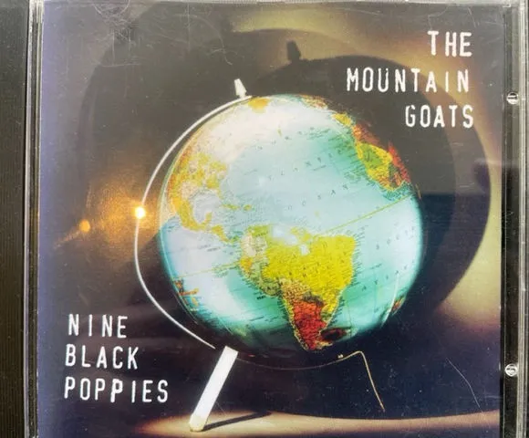Nine Black Poppies