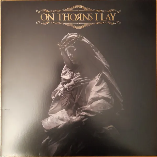ON THORNS I LAY BLACK